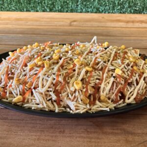 MAZORCADA MIXTA

Carne desmechada, pollo desmechado, champiñón, maíz tierno, queso, papa chip, salsas